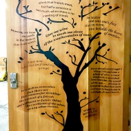 This amazing custom door greets you are you enter the wine making area.